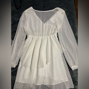 Medium white dress top is see through